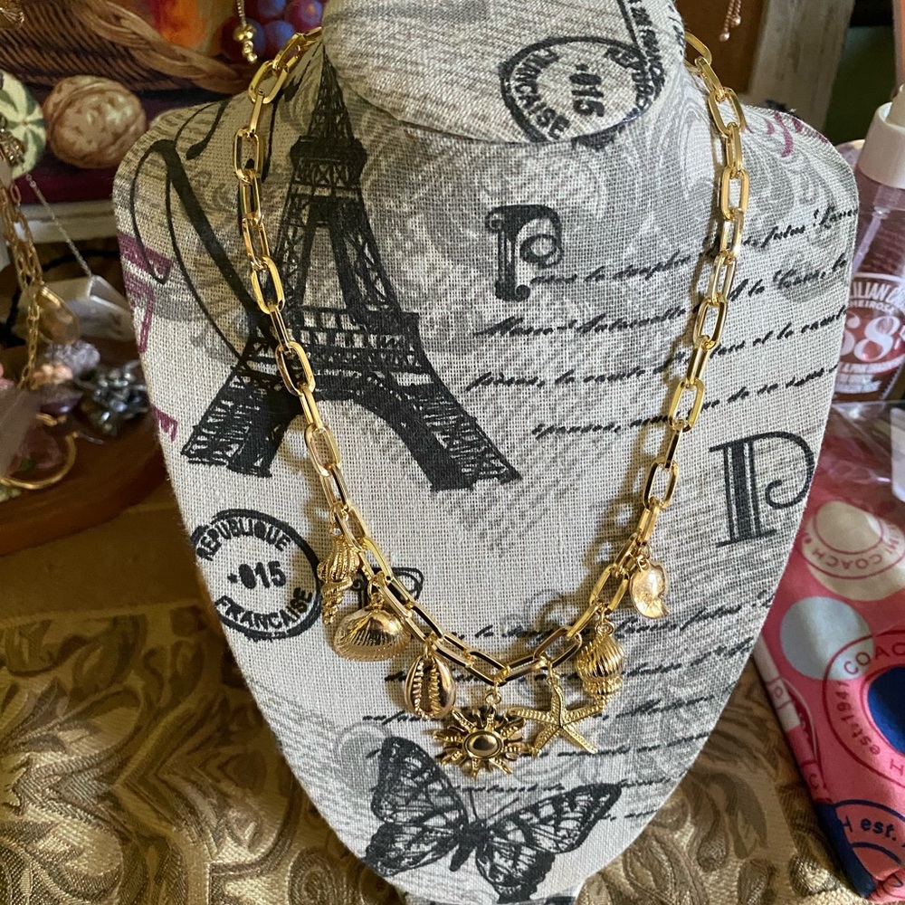 Charming Gold Necklace with Unique Charms